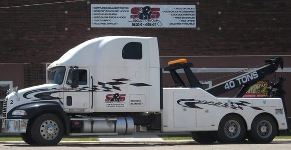 1 of several towing units parked in front of our main shop