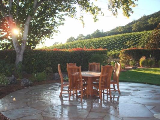 Classic Oak flagstone patio anchor a serene garden in a winery setting