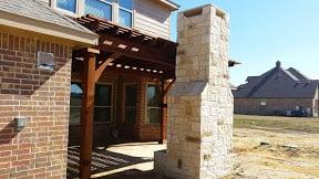 Western Red Cedar Arbor adds a great look with this Outdoor Fireplace!