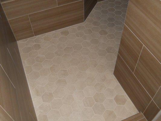 Hexagon shower floor and 12x24 tiles to match.