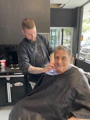 My dads getting his shave - looks so happy!