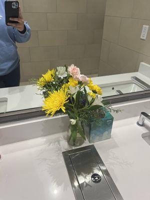 Fresh flowers in the restroom.