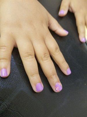 Treated my daughter to a mani pedi. Wonderful  tech worked on her nails.