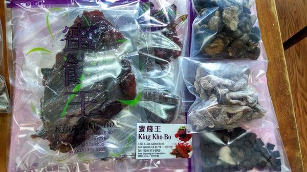 Pork jerky, mushroom chips, dried winter ginger and dried kumquat cubes