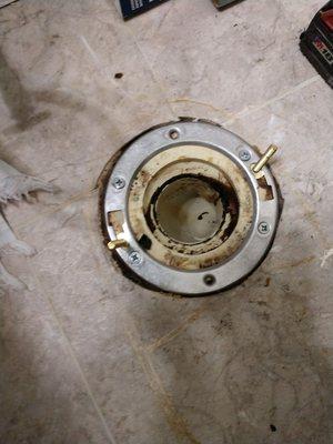 Repaired broken toilet flange. Original symptom was a wobbly toilet.