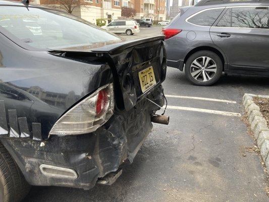 Damage to rear (bent frame, trunk, destroyed bumper)