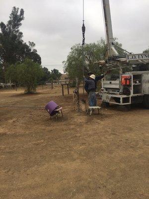 Pulling up our dead pump.