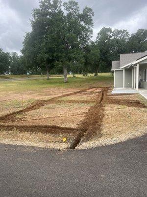 Front yard transformation, sprinklers, drip systems and sod installation.