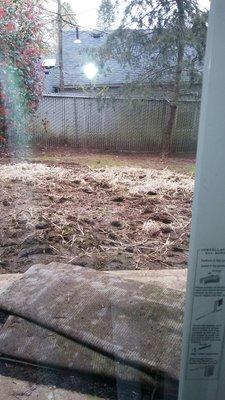 Yard 1 month after construction work's been done. STILL haven't cleaned up the mess. I can't walk out my back porch as it's covered in dirt.