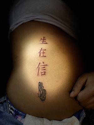 Inkstar side of the belly tattoo