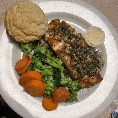 Grilled salmon topped with lemon caper glaze, served with wild rice and fresh steamed vegetables.