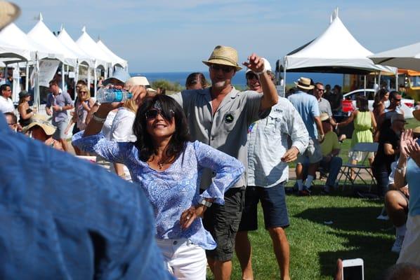 Attendees dancing to a live Motown R&B Soul band at the Trump Wine & Beer Festival, Palos Verdes CA.