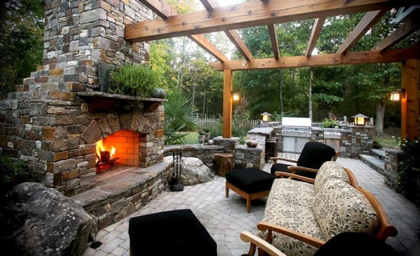 Wonderful outdoor living room with stone fireplace and patio.