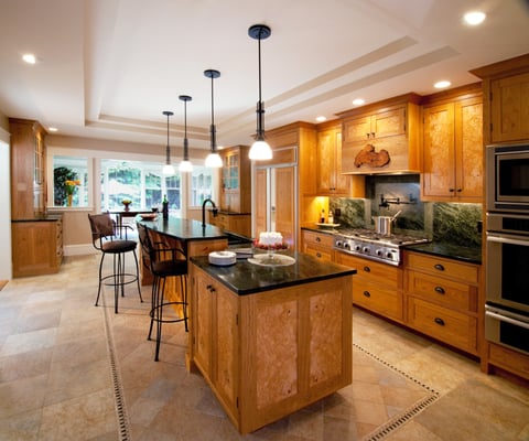 Custom cherry and Burl cabinetry in this kitchen renovation.