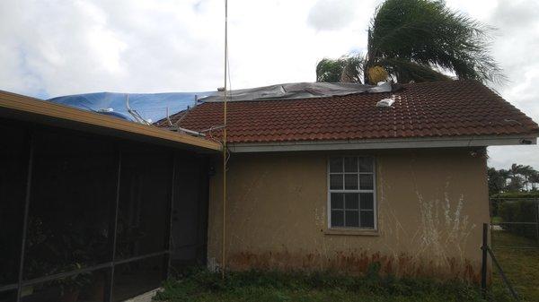 sand bag rolling off exposing my roof.