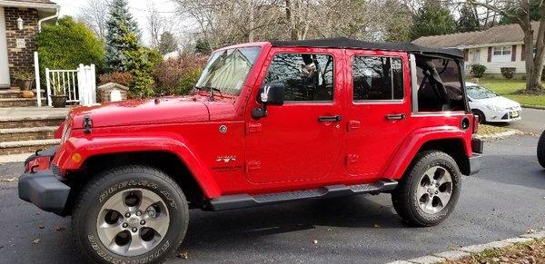 In the process of swaping from a soft top to the hard top for the winter.