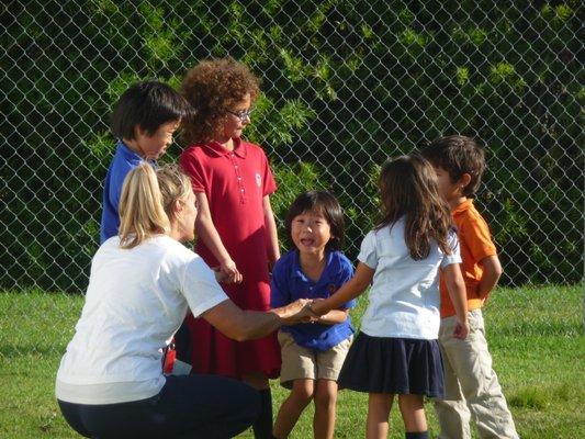 P.E. is an important part of school! Promoting teamwork!