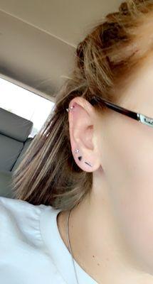 Ear piercings.