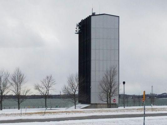 Somebody's having some fun. They moved a skyscraper from downtown to the edge of the water