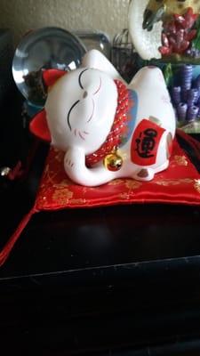 The cute little lucky cat piggy bank I got.

Love it!