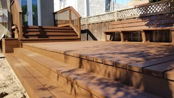 Redwood deck stained with walnut color stain