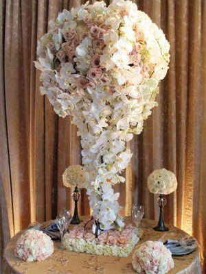 Extravagant 5ft tall wedding centerpiece with exclusive phalaenopsis orchids blush roses