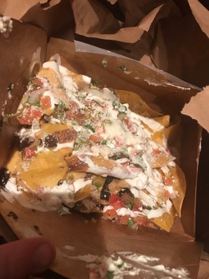 Nachos with all the toppings.