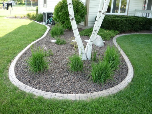 Decorative Landscape Curb Installed by MUDTeCH.