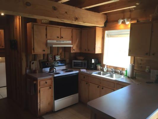 Complete kitchen with full size appliances, microwave, coffee maker