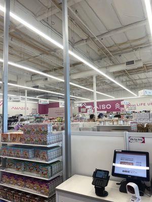 Overview from register area, including self check out and some snacks