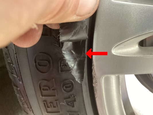 Dangerous cut in tire sidewall.