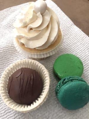 Blonde buxom cupcake, chocolate/chocolate cake ball, the green macaroon is the strawberry basil and the blue macaroon is the dulce macaroon.