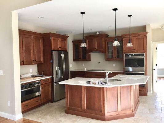 This recently remodeled kitchen featured maple stained cabinetry.