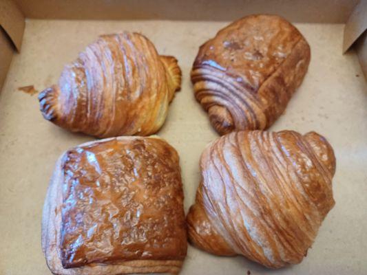 Butter croissants and chocolate-filled croissants .