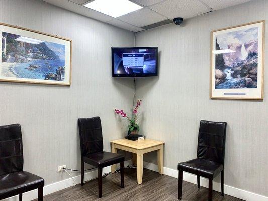 clean and comfortable waiting room with TV