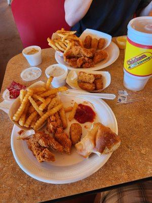 Spicy chicken fingers, fries, corn  nuggets,  jalapeño poppers, and sweet tea