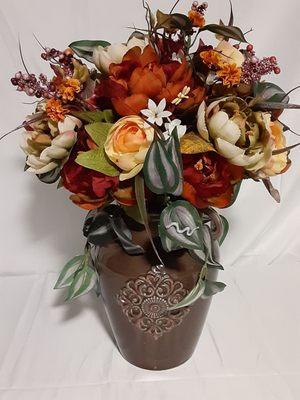 Enjoy these lovely, earthy silk Fall flowers in a beautiful brown ceramic vase for years to come. A gift of flowers to last a lifetime.