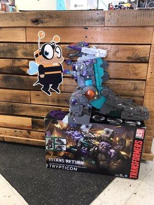 Transformer eating bee logo