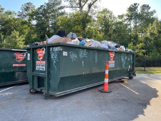 Overflowing dumpster