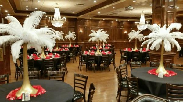 Ostrich Feather Tower Centerpieces can give any room that roaring 20's feel.