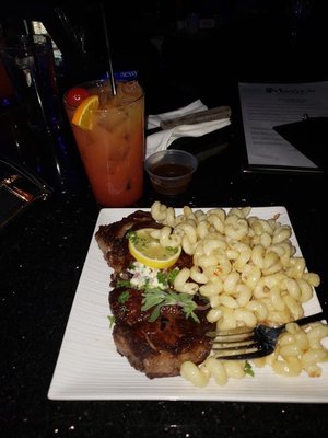 Peppercorn crusted steak, with truffled Mac and cheese