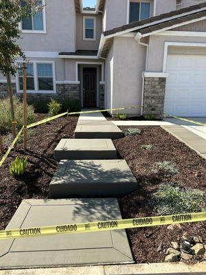 New set of steps/ broom finish concrete , staggered layout with 6" gap