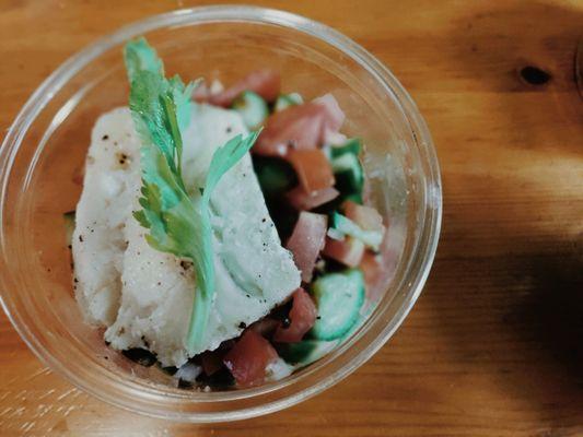 Cucumber, tomato, caper, lemon slaw with seared Pacific cod