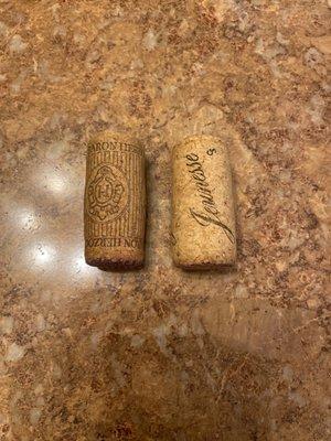 The cork on the left is the original wine vendors' cork (Baron Herzog). The one on the right is what the counterfeiters are using.