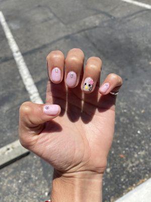 hello kitty gel manicure w/ rhinestones ; $45