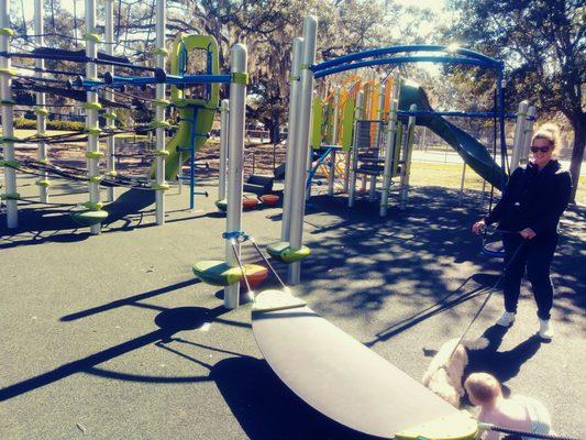 Fancy new playground equipment including the "Surfrider". I was not able to master it.