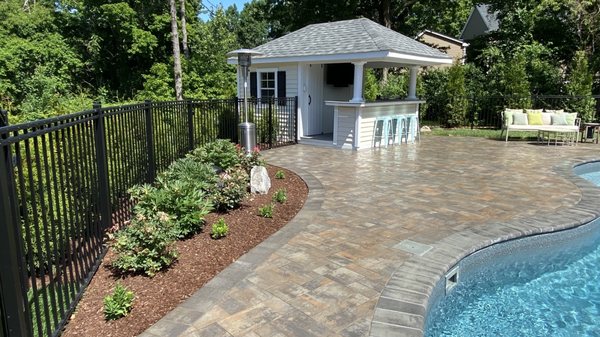 Pool house and showcase plant bed.