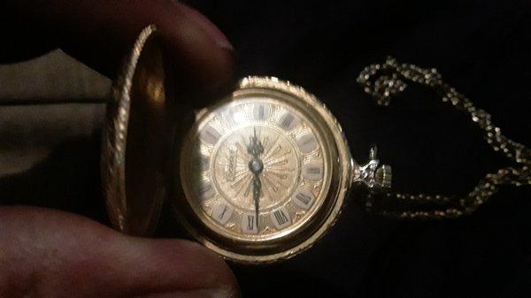 A dooeset pocket watch silver an fold may b white dont work seems wound to much found cleaning out home