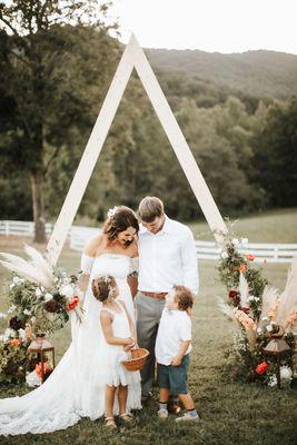 Ceremony with Triangle Boho Arch