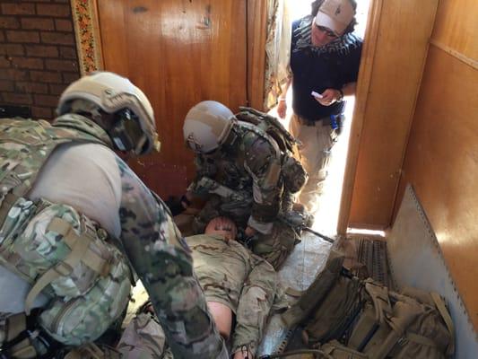 Special operators run rescue training while Warriorschool WS instructor observes.